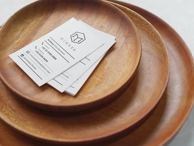 Mimesa business card on top of mimesa wooden plate